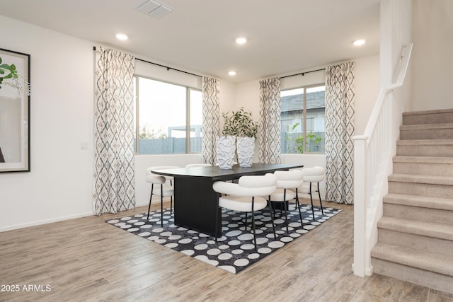 dining room with light hardwood / wood-style floors