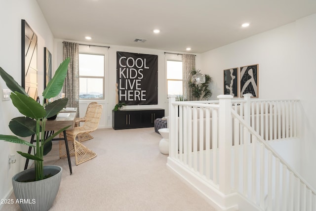 bedroom with carpet flooring and a crib