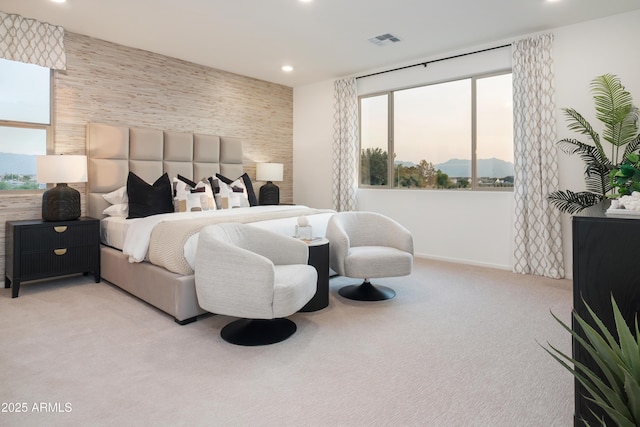 bedroom with light colored carpet