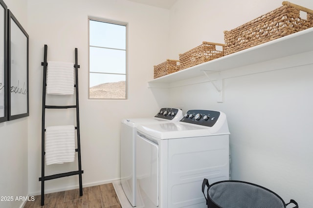 washroom featuring independent washer and dryer