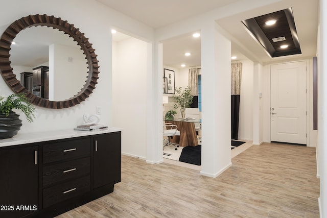 hallway featuring light hardwood / wood-style flooring