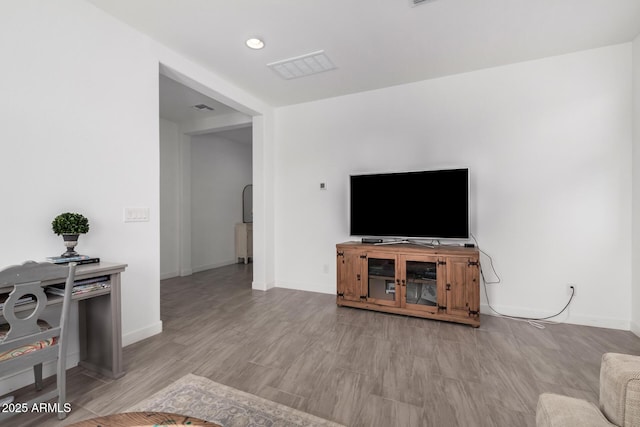 living room featuring light hardwood / wood-style floors