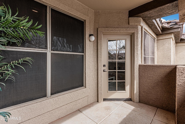 doorway to property with a balcony