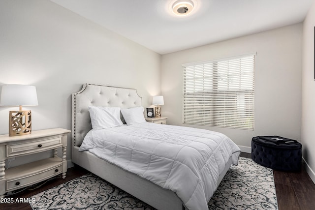 bedroom featuring dark hardwood / wood-style floors