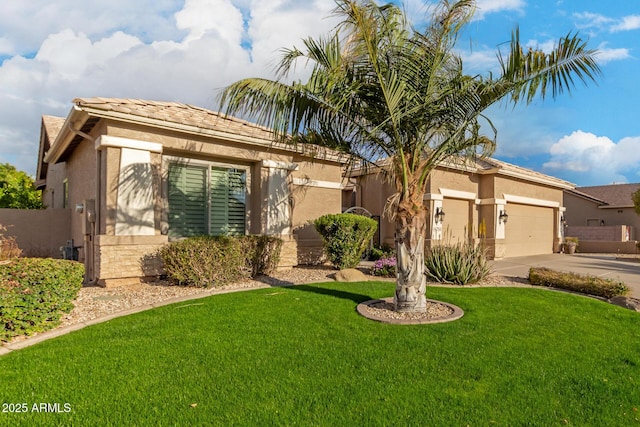 view of front of property featuring concrete driveway, stucco siding, an attached garage, and a front lawn
