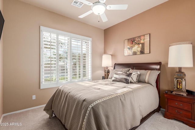 bedroom featuring baseboards, carpet flooring, ceiling fan, and visible vents