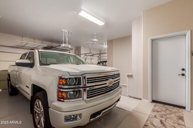 garage with a ceiling fan