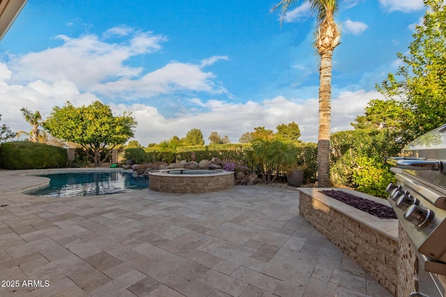 view of patio featuring a pool with connected hot tub