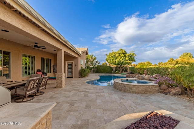 view of pool with an outdoor fire pit, a fenced in pool, ceiling fan, and a patio