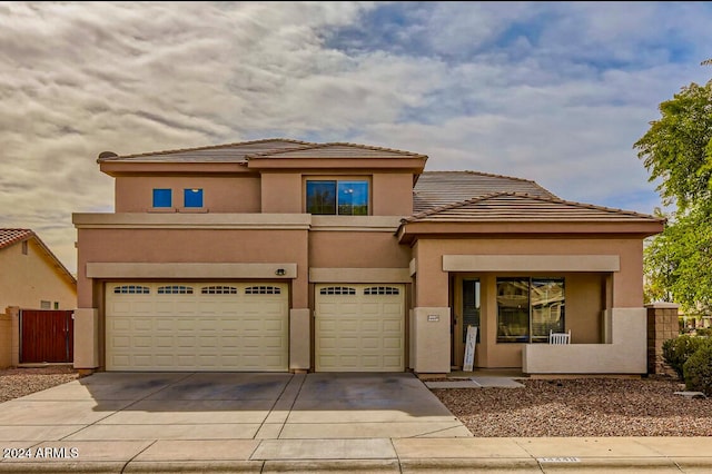 prairie-style home featuring a garage