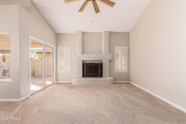 unfurnished living room with carpet, ceiling fan, and lofted ceiling