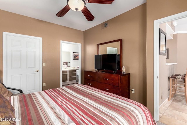 bedroom featuring connected bathroom, baseboards, a ceiling fan, and visible vents