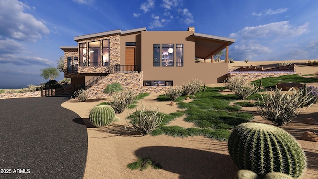 17929 W Estes Way, Goodyear, AZ 85338 - view of front of property with stairway, stone siding, and stucco siding