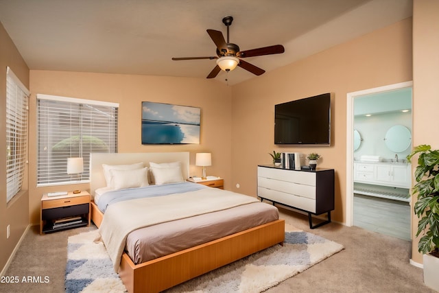 12044 S 45th St, Phoenix, AZ 85044 - carpeted bedroom featuring ensuite bathroom, baseboards, a sink, and a ceiling fan