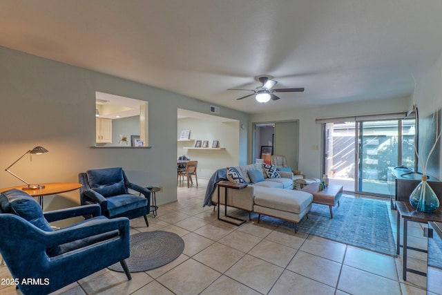 bedroom featuring access to exterior, light tile patterned flooring, ceiling fan, and visible vents