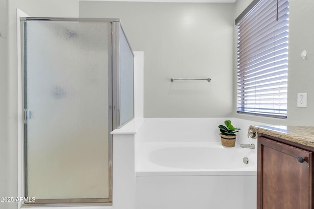 4323 S Ranger Trl, Gilbert, AZ 85297 - bathroom with a stall shower, a garden tub, and vanity