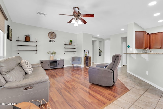 4323 S Ranger Trl, Gilbert, AZ 85297 - living area with a ceiling fan, recessed lighting, baseboards, and light tile patterned floors