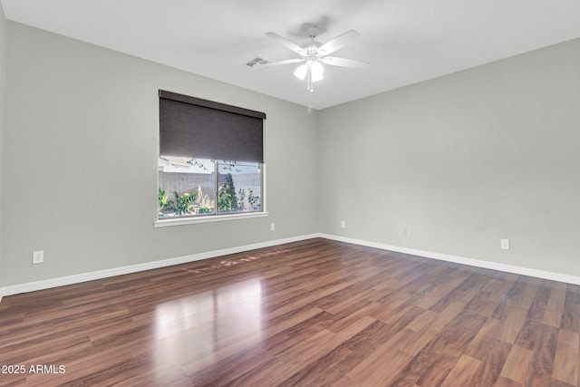4323 S Ranger Trl, Gilbert, AZ 85297 - unfurnished room with a ceiling fan, wood finished floors, and baseboards