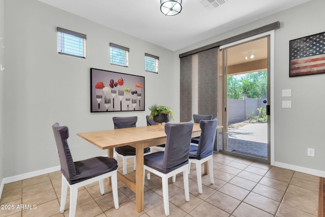 4323 S Ranger Trl, Gilbert, AZ 85297 - dining area featuring healthy amount of natural light, light tile patterned floors, and baseboards