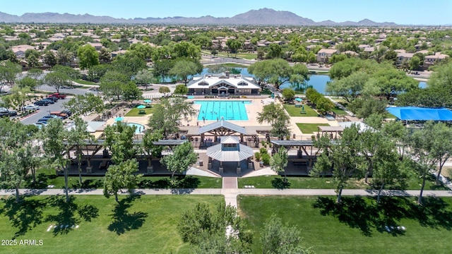 4323 S Ranger Trl, Gilbert, AZ 85297 - drone / aerial view of a pool area and a water and mountain view