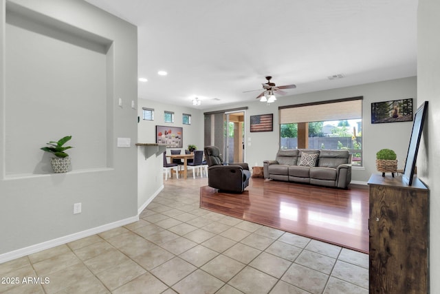 4323 S Ranger Trl, Gilbert, AZ 85297 - living area featuring light tile patterned floors, ceiling fan, recessed lighting, and baseboards