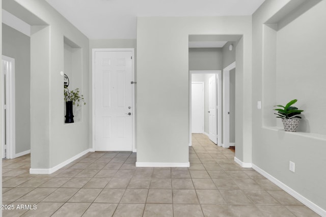 4323 S Ranger Trl, Gilbert, AZ 85297 - entryway featuring light tile patterned flooring and baseboards
