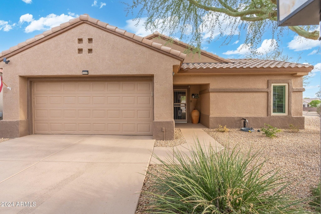 view of front of home with a garage