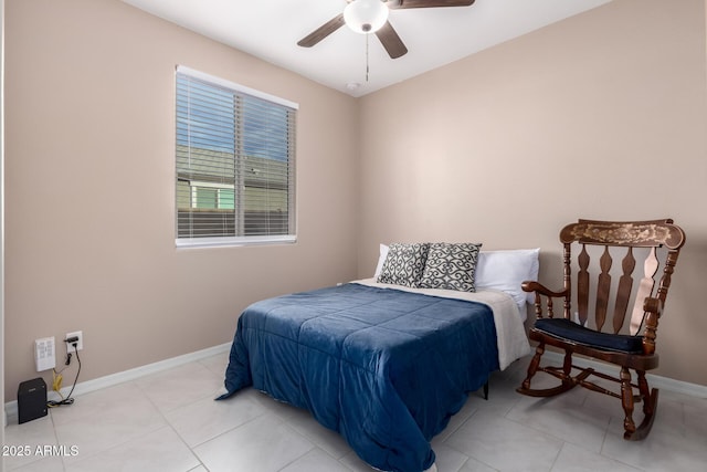 tiled bedroom with ceiling fan