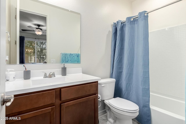 full bathroom with vanity, ceiling fan, shower / bath combo with shower curtain, and toilet