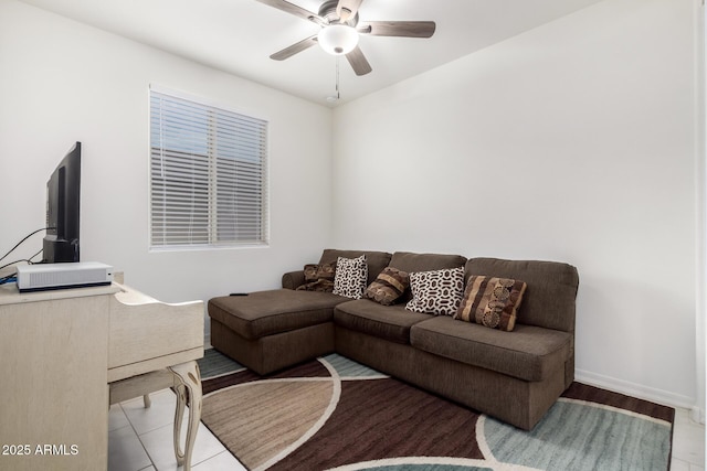 tiled living room featuring ceiling fan