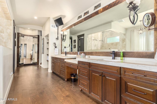 5039 S 158th St, Gilbert, AZ 85298 - full bathroom featuring double vanity, visible vents, wood finished floors, a sink, and baseboards