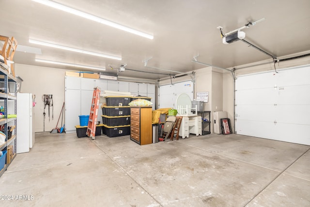 garage featuring a garage door opener