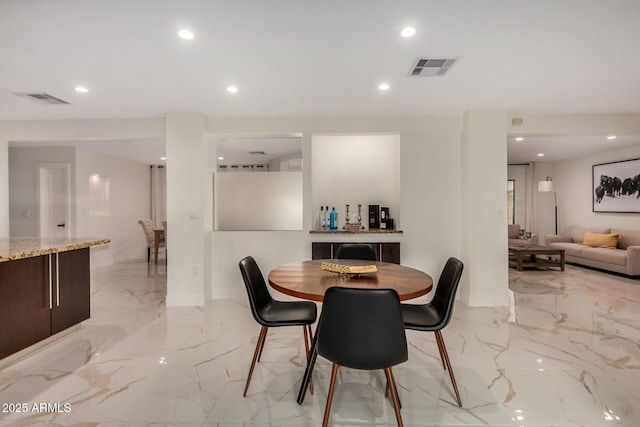 12821 N 67th St, Scottsdale, AZ 85254 - dining space featuring light marble finish flooring and recessed lighting