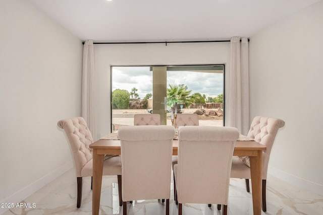 12821 N 67th St, Scottsdale, AZ 85254 - dining area featuring light marble finish flooring, baseboards, and french doors