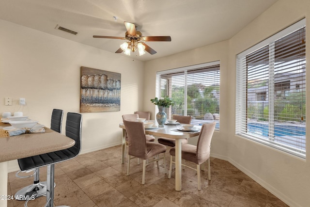 dining room with ceiling fan