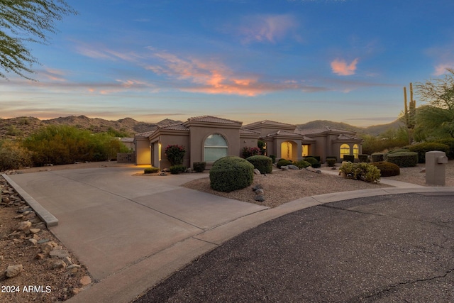 view of front of house with a mountain view