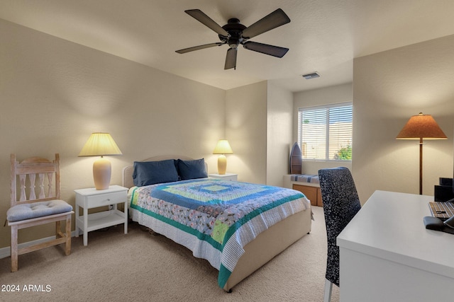 bedroom with ceiling fan and carpet