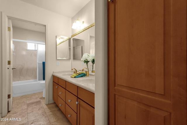 full bathroom featuring vanity, toilet, and tub / shower combination