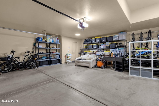 garage featuring a garage door opener