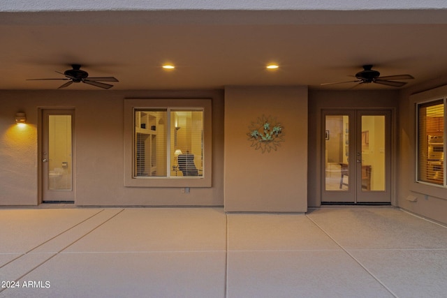 view of patio with ceiling fan and french doors