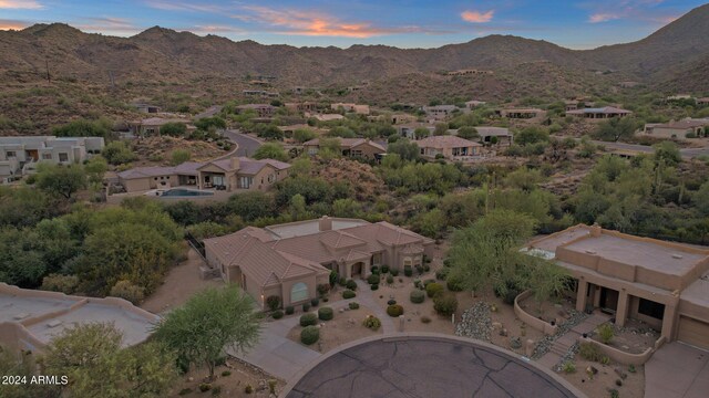 aerial view at dusk with a mountain view