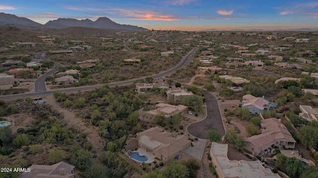 aerial view at dusk with a mountain view