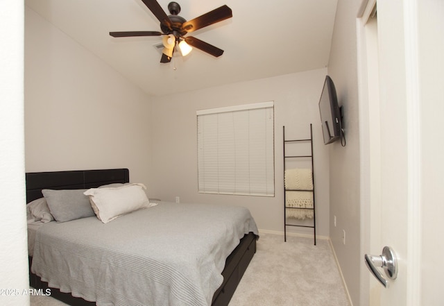 bedroom with light carpet and ceiling fan