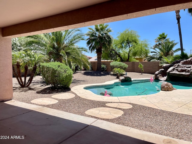 view of pool featuring a patio