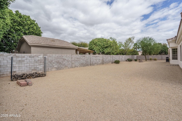 view of yard featuring a fenced backyard