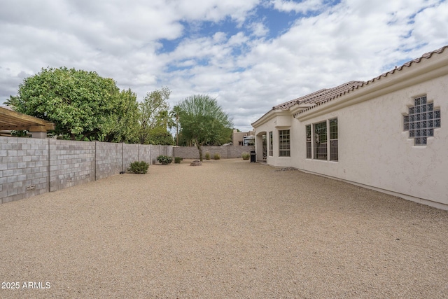 view of yard featuring a fenced backyard