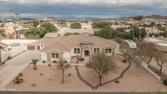 exterior space with a residential view and a mountain view