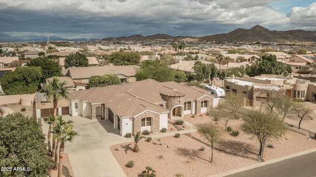 birds eye view of property featuring a residential view and a mountain view