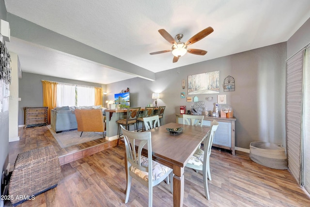 2524 S El Paradiso Dr Unit 82, Mesa, AZ 85202 - dining room with ceiling fan, baseboards, and light wood finished floors