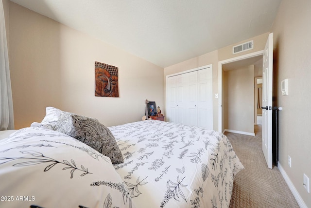 2524 S El Paradiso Dr Unit 82, Mesa, AZ 85202 - bedroom featuring light carpet, a closet, baseboards, and lofted ceiling